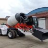 Mobile self loading concrete mixer